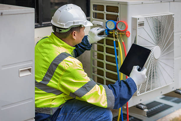Professional Hvac technician working in Ellicott City, MD